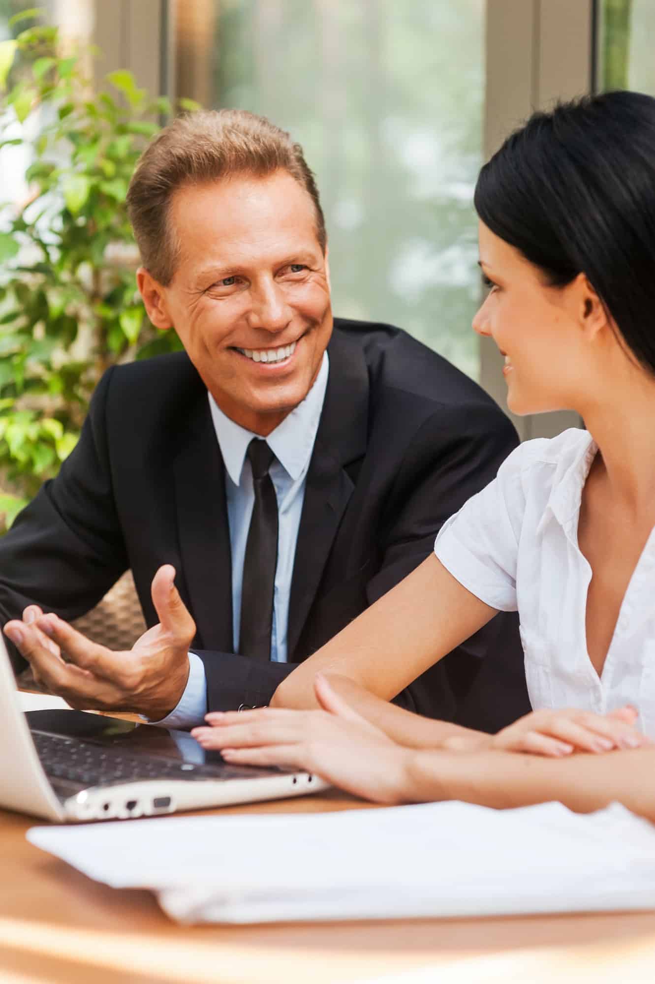 men and women in the Business meeting.