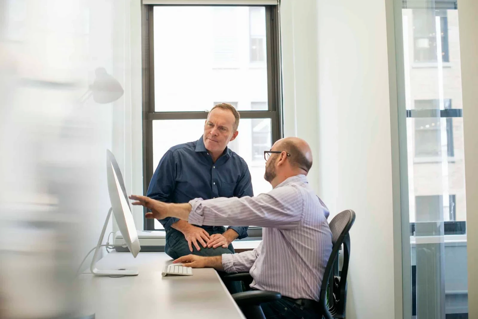 Blockchain consultancy experts collaborating on effective business solutions modern office