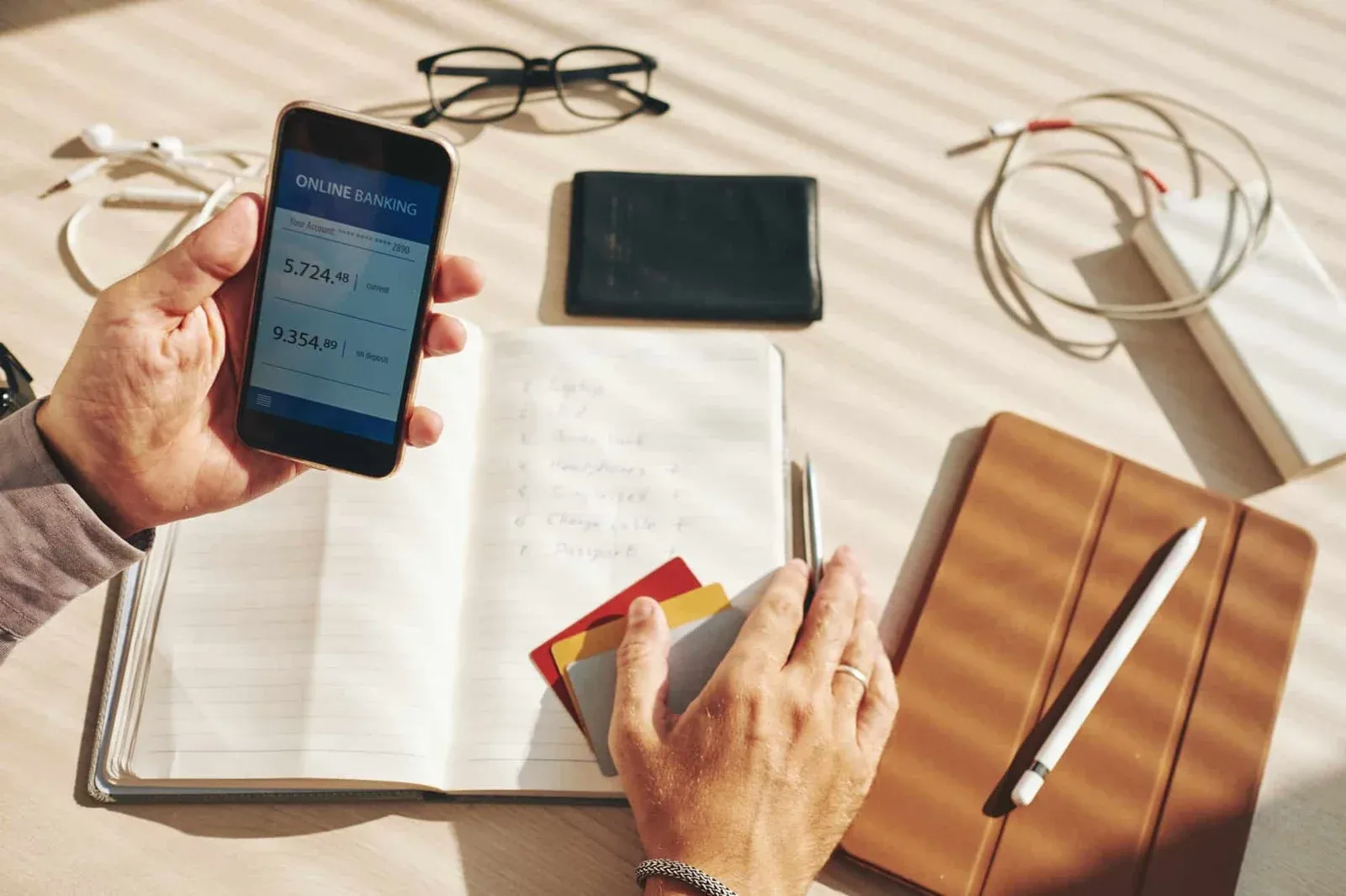 Professional using online banking app with blockchain services workspace setup