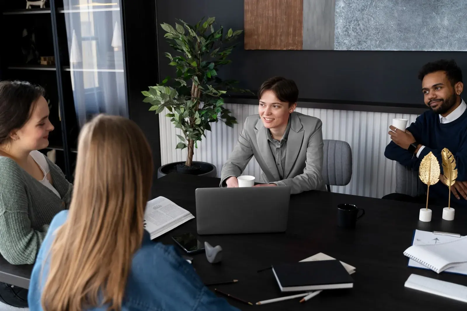 Consultant presenting strategy to clients at table