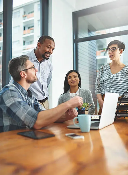 Product specialists analyzing positioning and market alignment strategy for business growth plans