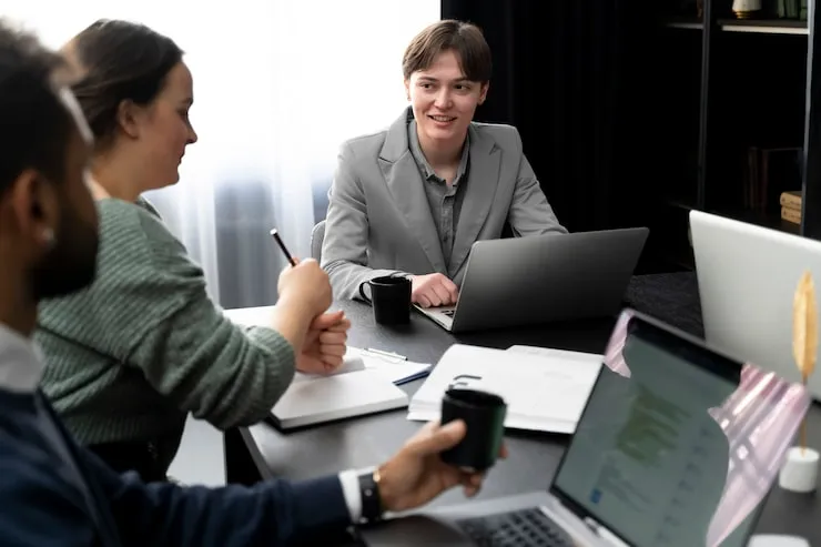Business turnaround consultancy professionals discussing restructuring plans and financial recovery steps